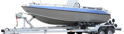 A boat secured on a trailer for city-to-city transport